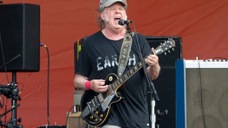 "Neil Young Offers Greenland's Residents Relief Through His Music and Films Amidst the Challenges of an Unpopular Government"]