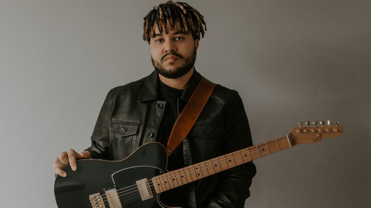 Stray Kids' Guitarist Garrett Jones Discusses His Experience as a K-pop Session Musician]