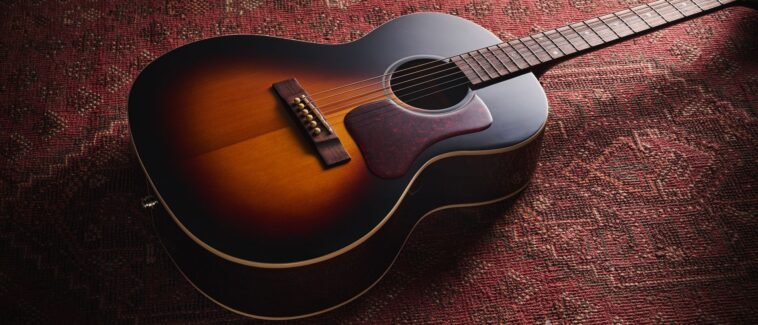 "This guitar excels in the hands of blues and folk players"—Review of the Epiphone Blues King Studio.]
