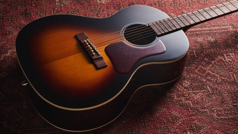 "This guitar excels in the hands of blues and folk players"—Review of the Epiphone Blues King Studio.]