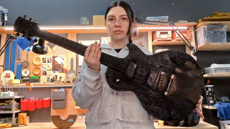 Ukrainian Guitar Maker Repairs Instrument Damaged by Drone Attack]