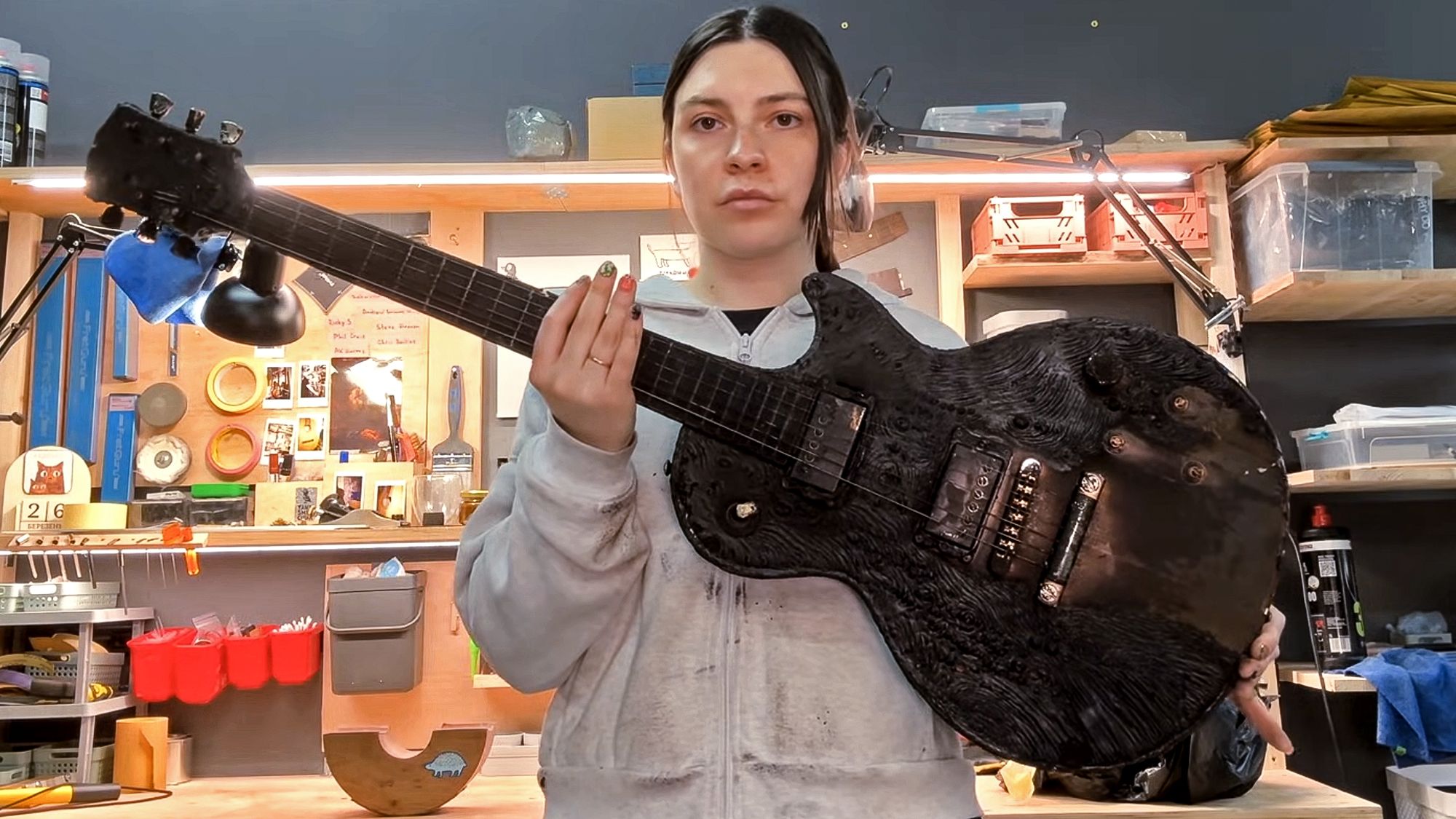 Ukrainian Guitar Maker Repairs Instrument Damaged by Drone Attack]