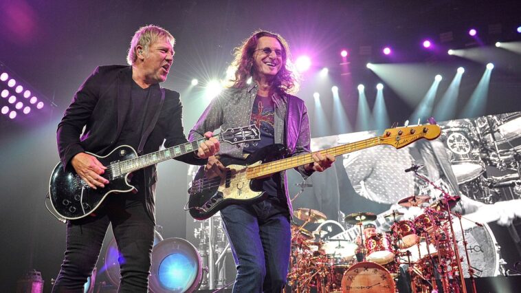 “Uncertain Future, But Geddy Lee Hints at New Rush Music: Collaboration with Alex Lifeson Possible if They 'Make It Through the Tour'”]