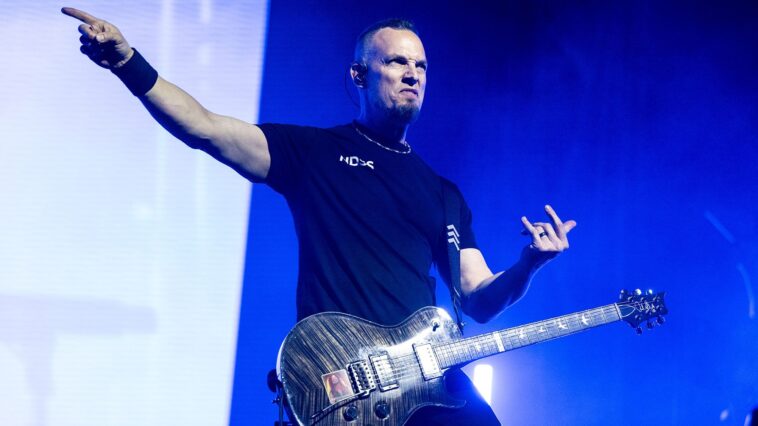 "Upon opening the door... I found him with a guitar in hand, playing jazz. I had no clue he was that talented": Mark Tremonti discusses Alter Bridge's "hidden gem" and his techniques for breaking free from repetitive pentatonic patterns.]