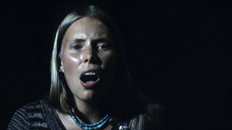 "When I first presented it publicly, I broke down in tears, overwhelmed by the memories": The Story Behind Joni Mitchell's Iconic Song "Woodstock" that Captured a Generation.]