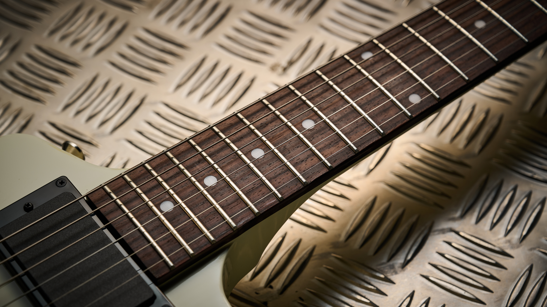 The rosewood neck on the Epiphone Explorer 80s EMG electric guitar