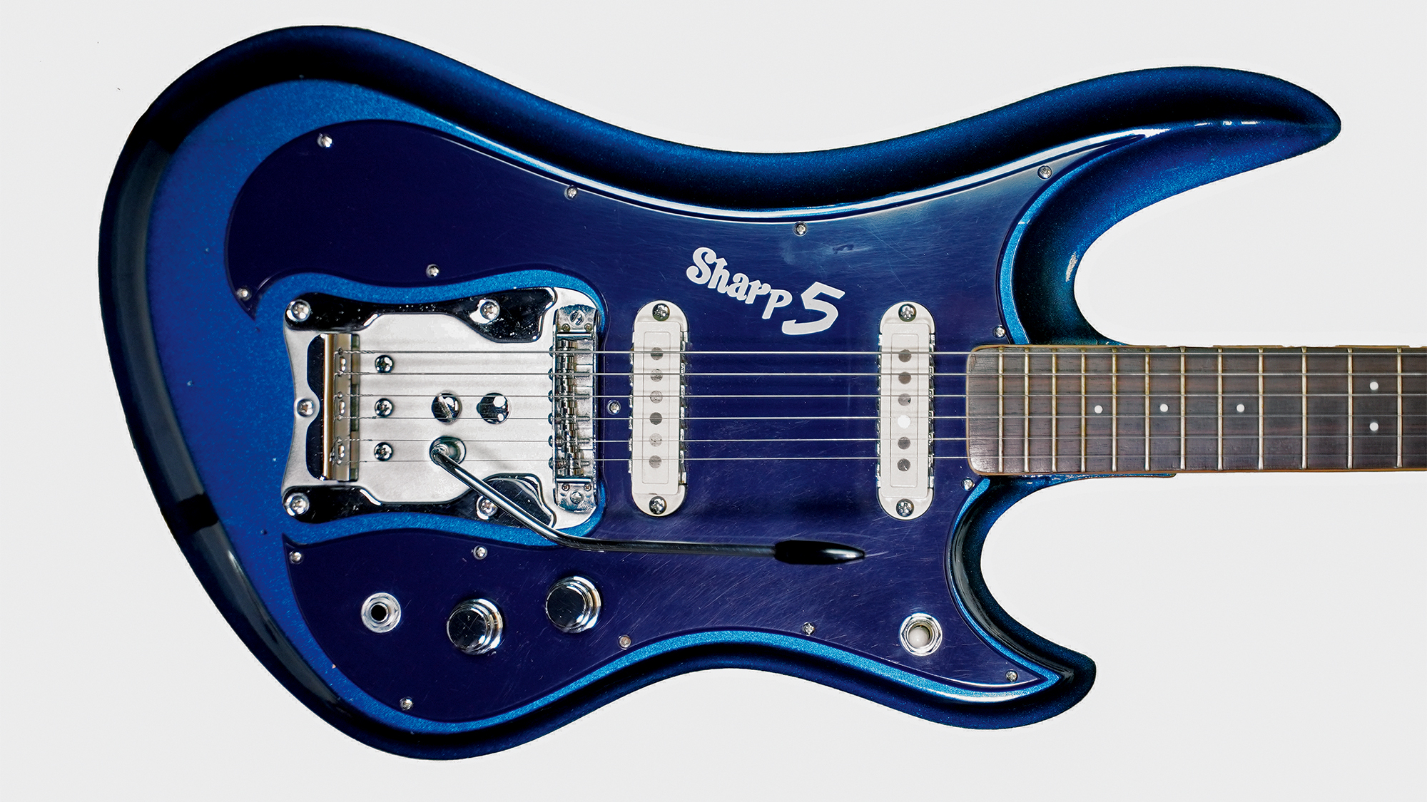 A photo showing a detail of a 1968 Guyatone LG 350-T Sharp 5 electric guitar