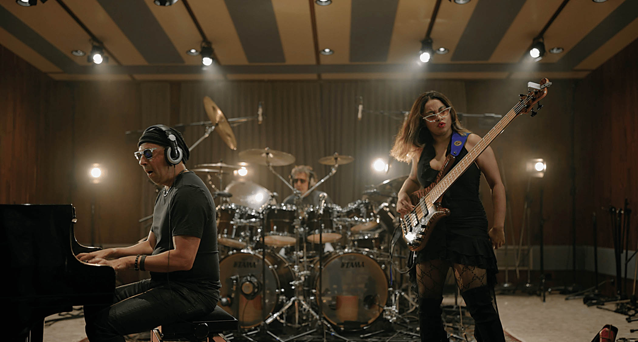 DarWin (who takes on rhythm guitar) on piano, Simon Phillips on drums and bassist Mohini Rey record in the studio, while numerous other artists, including Greg Howe on lead guitar, track&nbsp;remotely