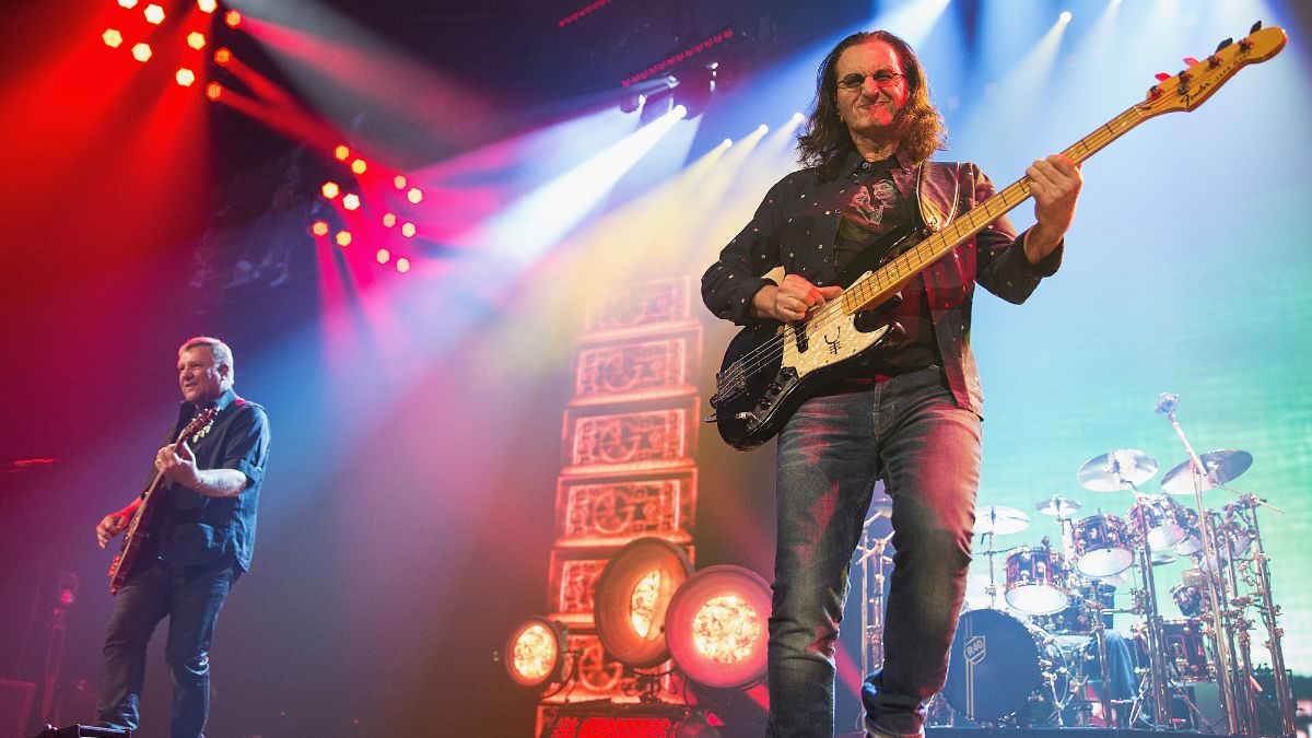 Alex Lifeson, Geddy Lee and Neil Peart of Rush performs on stage during the R40 LIVE Tour at KeyArena on July 19, 2015 in Seattle, Washington.