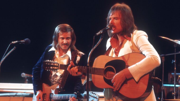 “‘I need to play on this. Get me a track’: How three legendary session guitarists and a brilliant input from young Steve Lukather rescued a classic soft-rock hit from the '70s.”]