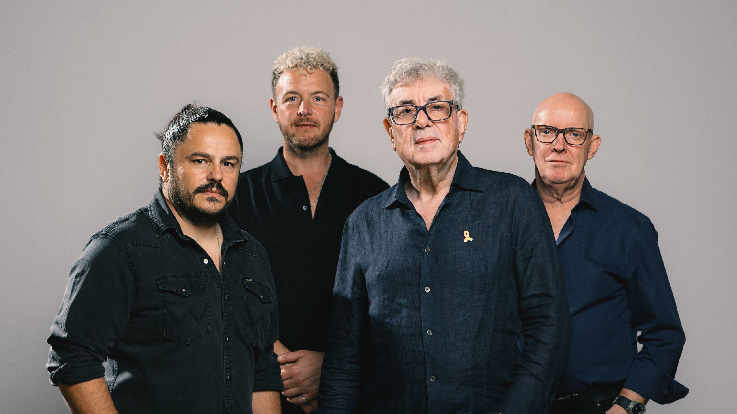 "10cc's Graham Gouldman Reflects on Collaborating with Paul McCartney at Strawberry Studios: A Daily Delight of Friendship Amidst Our Packed Gear"]