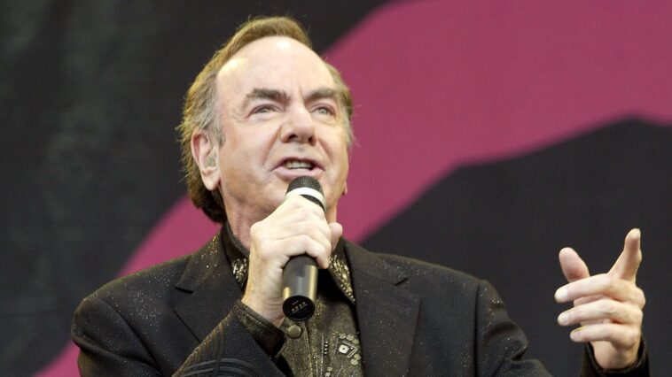 “After hearing some of his collaborations with Johnny Cash, I was truly impressed, which sparked my interest in working with him”: Neil Diamond achieved his first US No. 1 album at 67, thanks to producer Rick Rubin's assistance.]