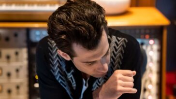 "An exceptional talent for enhancing every project he touches... his artistic impact reaches all facets of modern culture": Mark Ronson honored with Outstanding Contribution to Music award at the Brits.]