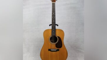 Authorities search for thieves following $15,000 Martin D-28 guitar heist.]