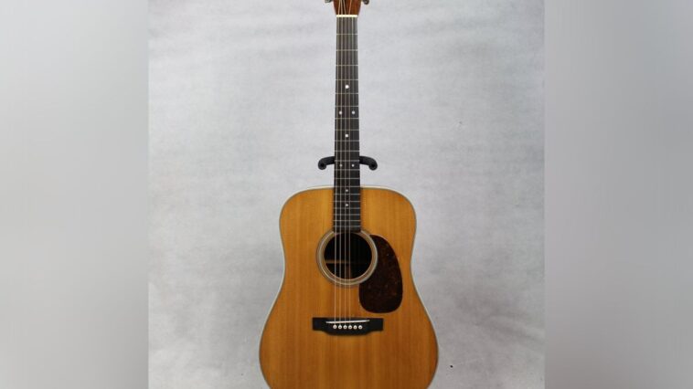 Authorities search for thieves following $15,000 Martin D-28 guitar heist.]