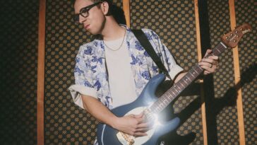 “Designing a Guitar That Matched My Vision: Cory Wong's Use of Humbuckers to Transform Ernie Ball Music Man’s Renowned Bass into a Signature Electric with 'That George Benson Tone'”]