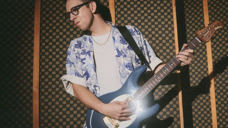 “Designing a Guitar That Matched My Vision: Cory Wong's Use of Humbuckers to Transform Ernie Ball Music Man’s Renowned Bass into a Signature Electric with 'That George Benson Tone'”]