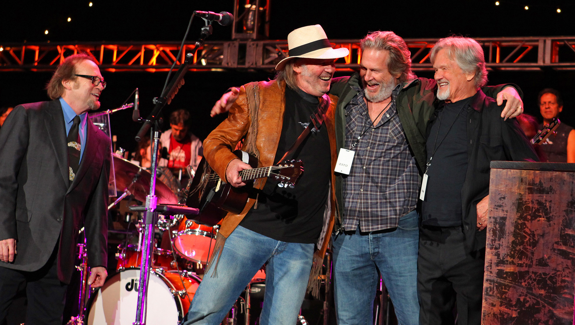 Musicians Stephen Stills, Neil Young, actor Jeff Bridges and musician Kris Kristofferson during the encore at Neil Young's 24th Annual Bridge School Benefit Concert at Shoreline Amphitheatre on October 24, 2010 in Mountain View, California.
