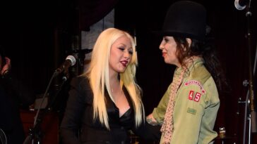"Here's a look at a seemingly perfect 'hot chick' who's seeking a song about beauty—how superficial is that? The story of how Christina Aguilera came to record a Linda Perry track that she's now embraced."]