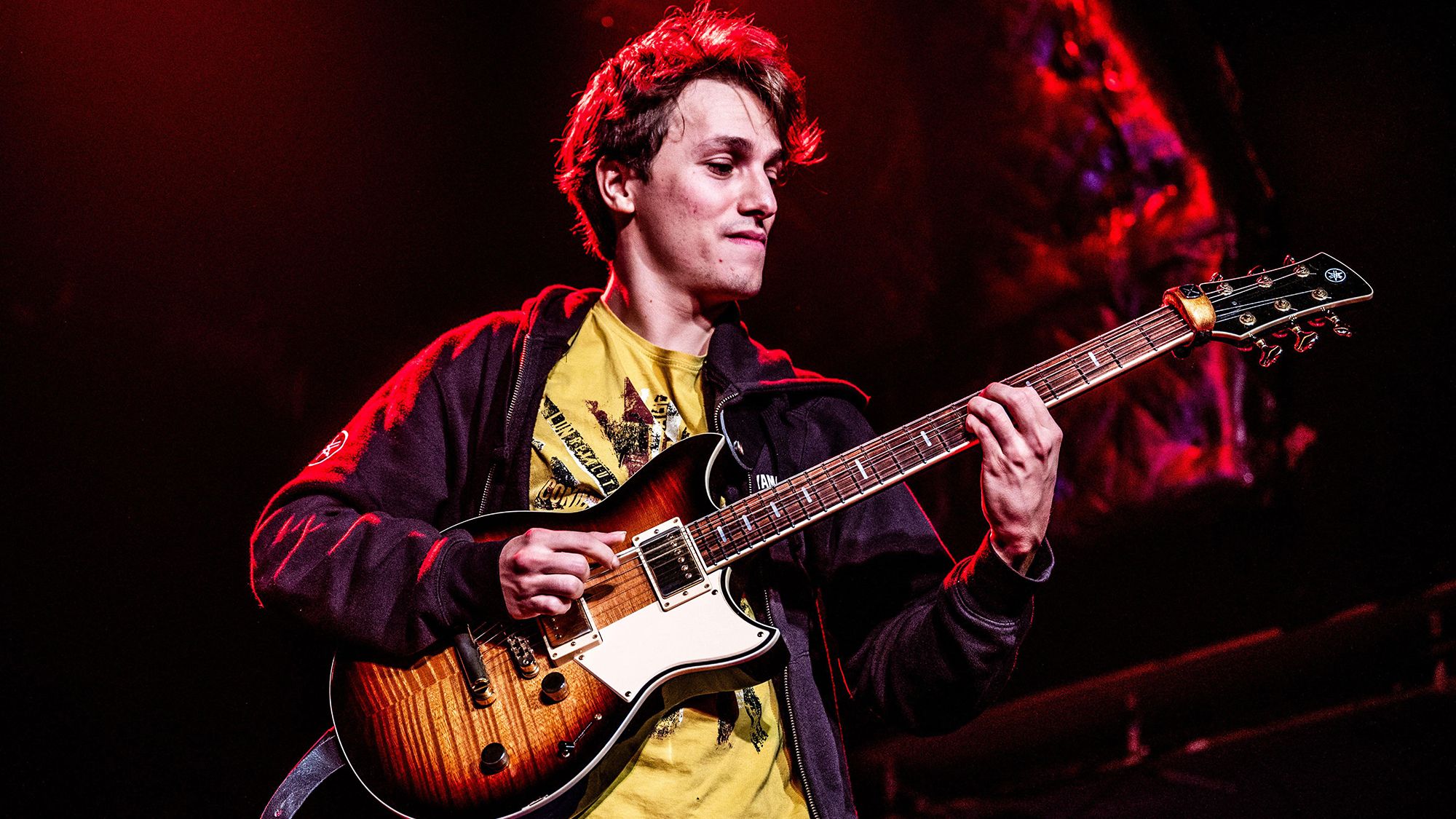 Matteo Mancuso Discusses Steve Vai, Electric Fingerstyle Techniques, and His Gear Setup]