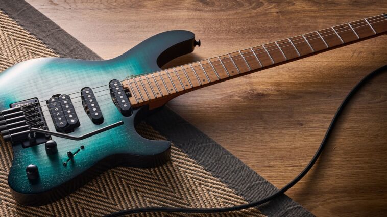 "My sole disappointment lies in its inconsistent tuning, which overshadows an otherwise amazing playing experience: Cort Space G6TR review."]