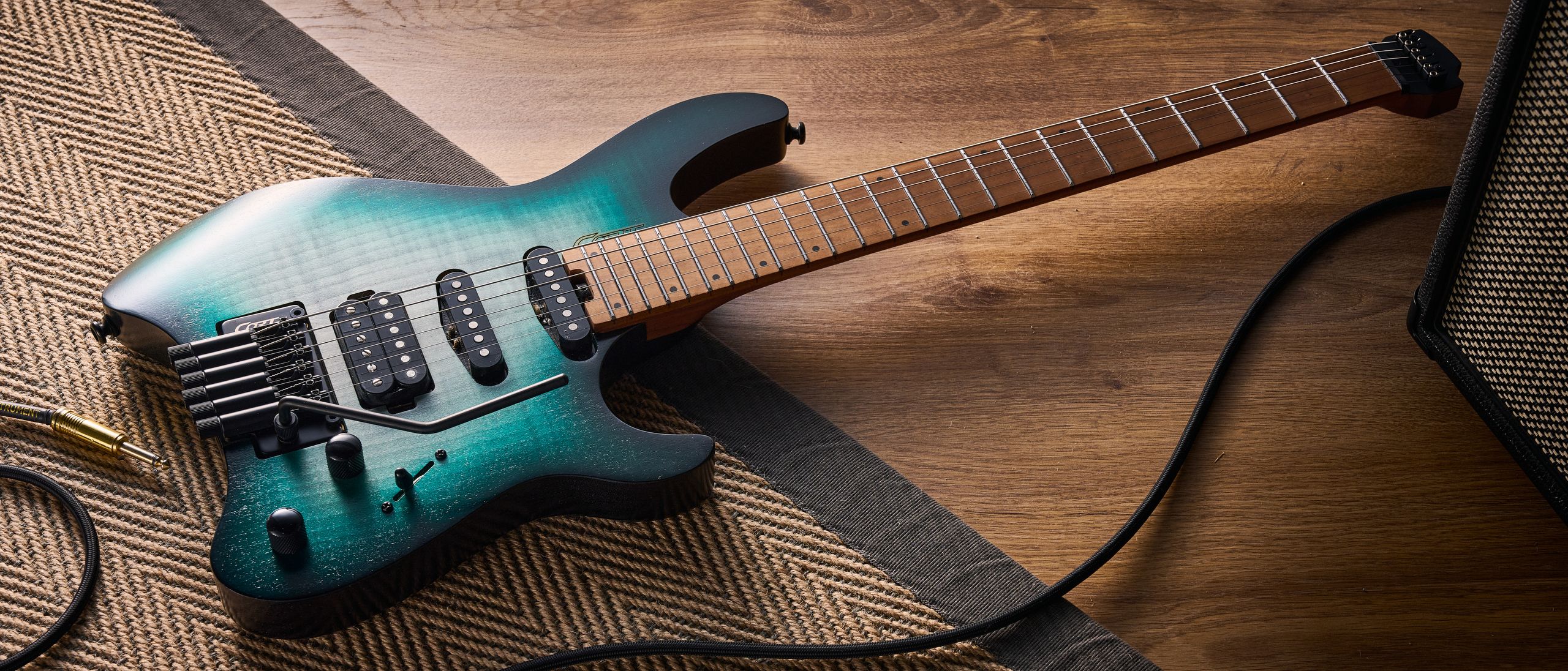 "My sole disappointment lies in its inconsistent tuning, which overshadows an otherwise amazing playing experience: Cort Space G6TR review."]