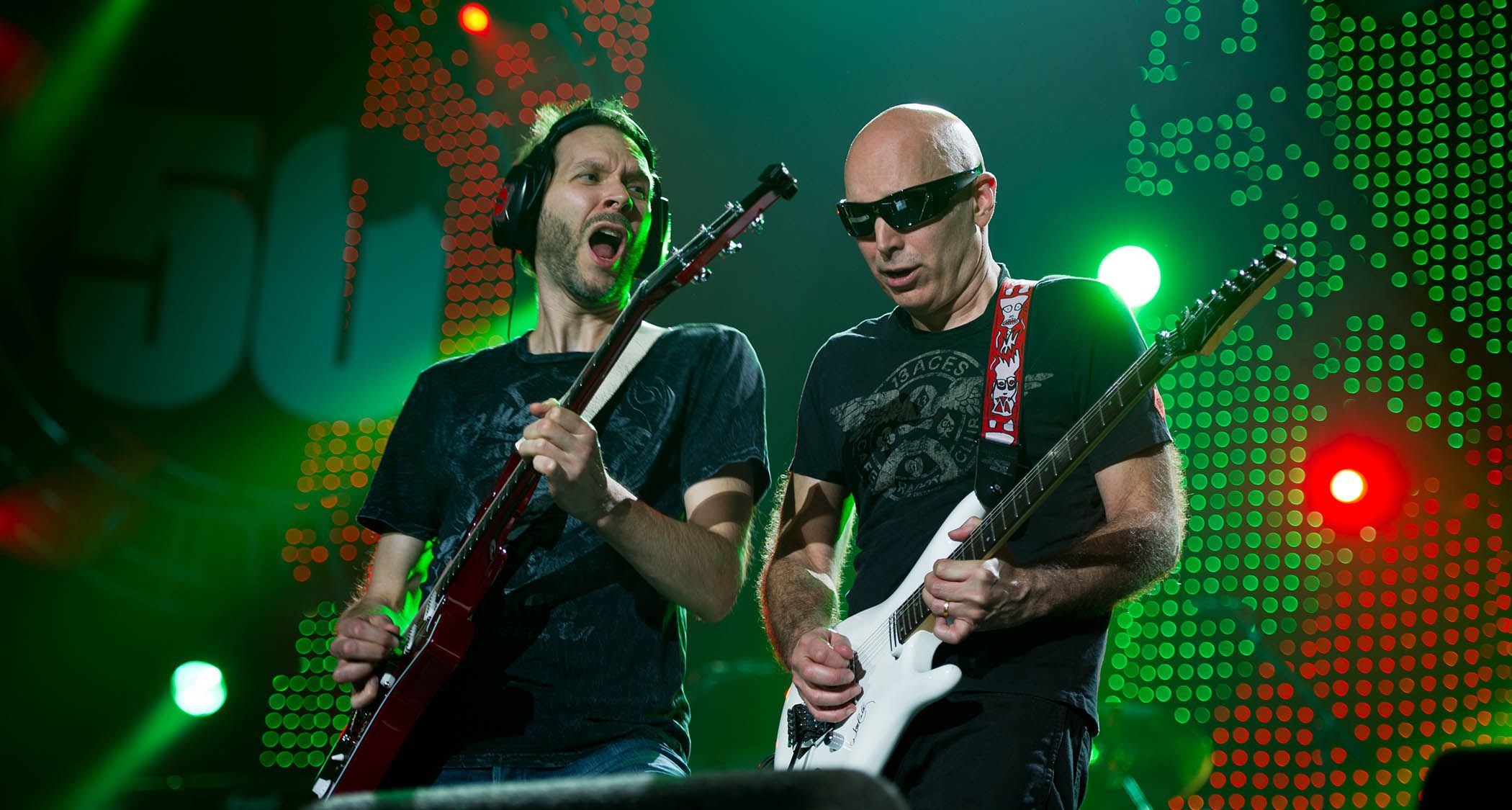 "Paul Gilbert Reflects on Joe Satriani's Insight: 'Each Album Feels Like a Challenge to Showcase My Guitar Skills' — Understanding the Temptation to Shred"]