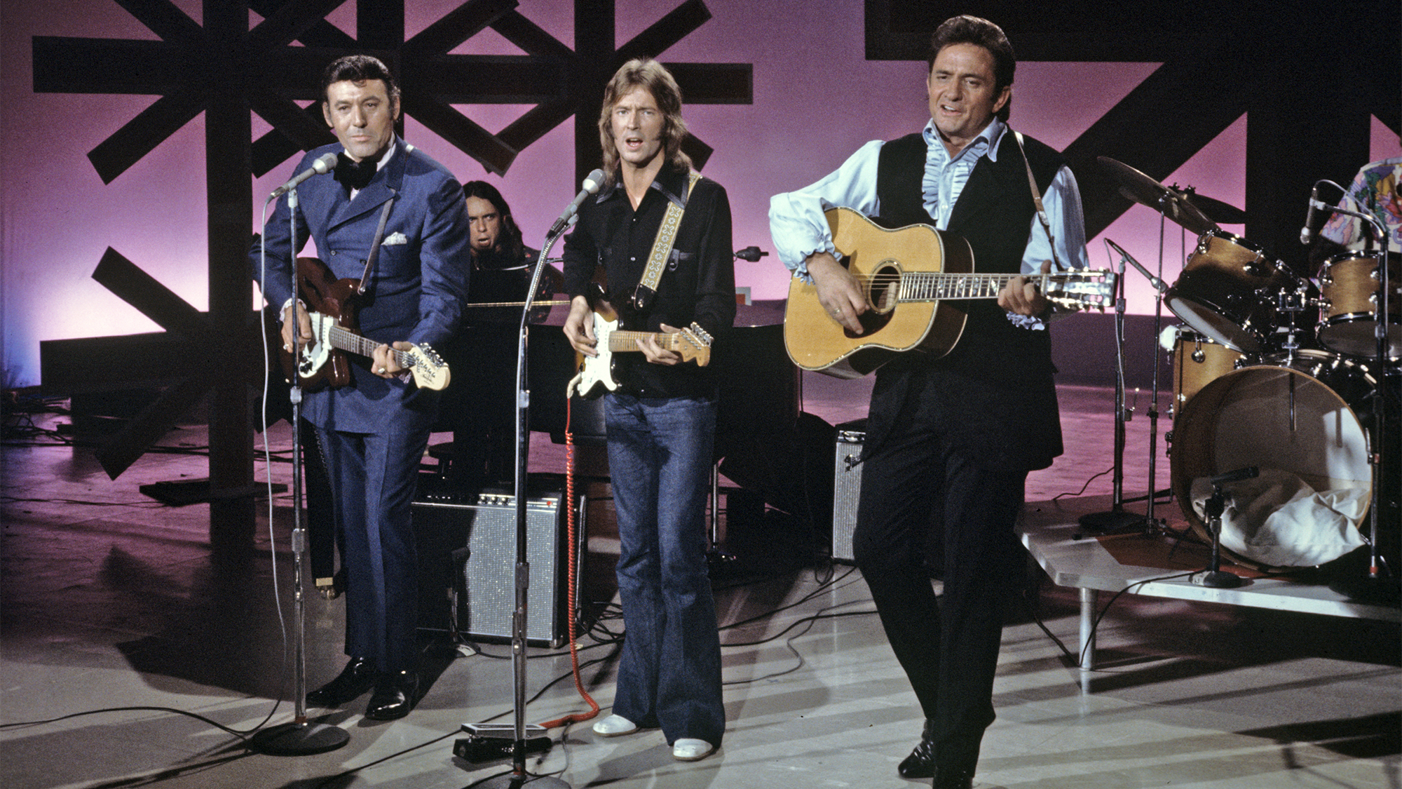 Carl Perkins, Eric Clapton (with Derek and the Dominos) and Johnny Cash perform on The Johnny Cash Show in November 1970.