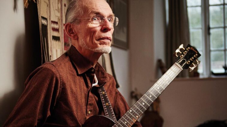 Steve Howe discusses conquering stage anxiety and his initial guitar experience.]