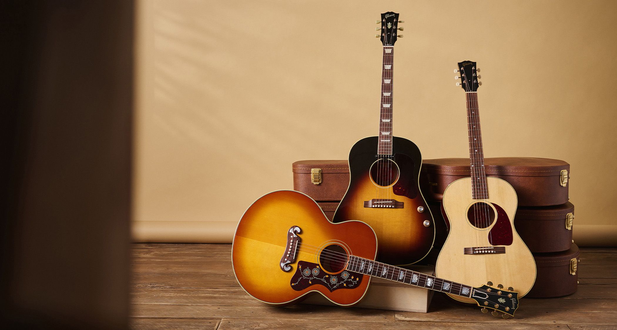The Beatles-approved J-160E returns as Gibson unveils three Original Collection flat-tops honoring the golden age of acoustic guitar craftsmanship.]