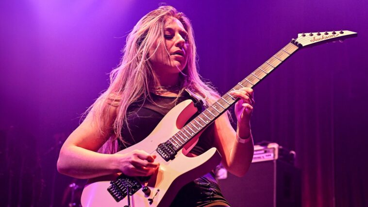 "Unleashing the Powerhouse Performers! Excited to Experience This." Nita Strauss and Joe Satriani-endorsed guitarist secures a new role with a metal legend.]