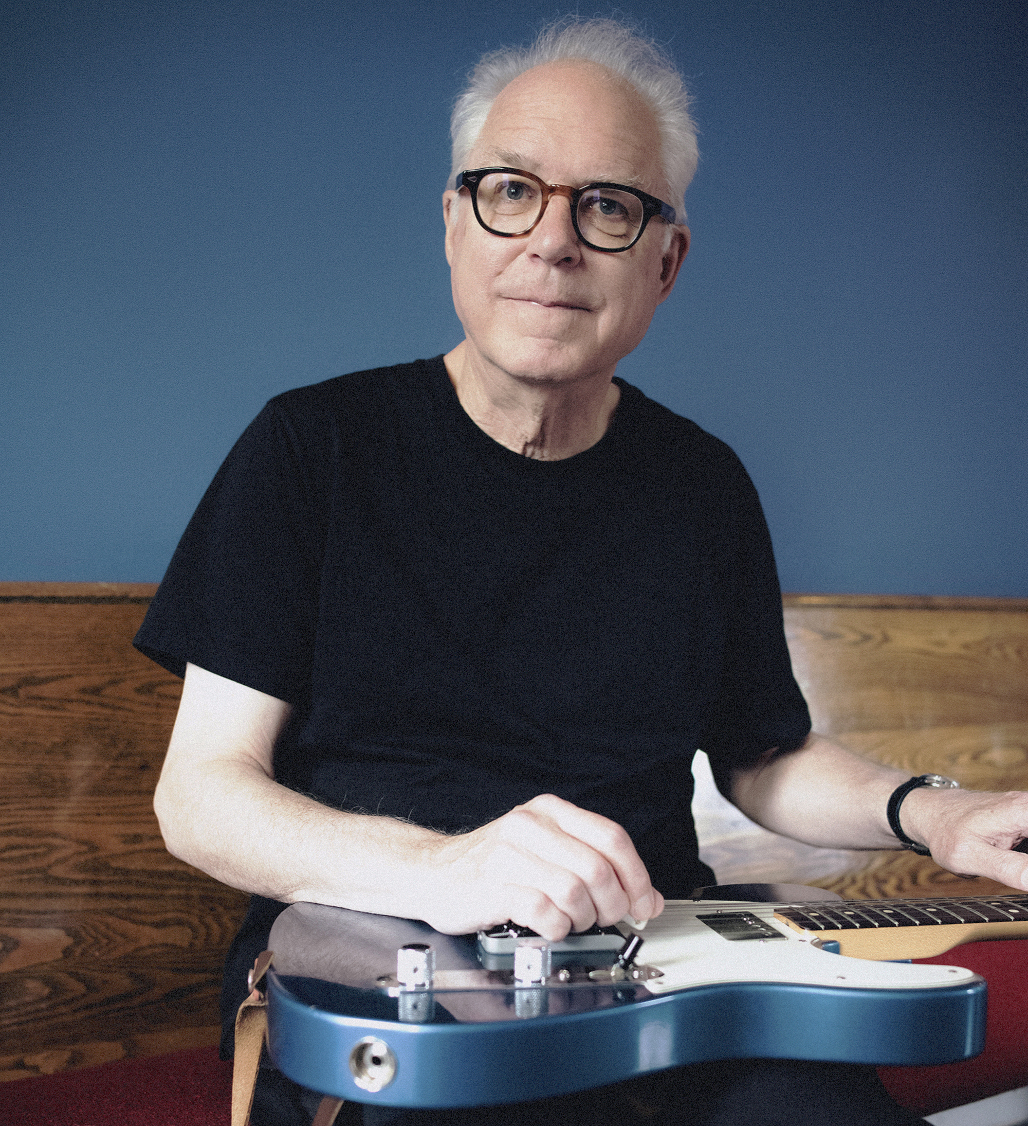 Bill Frisell poses with a Fender Telecaster
