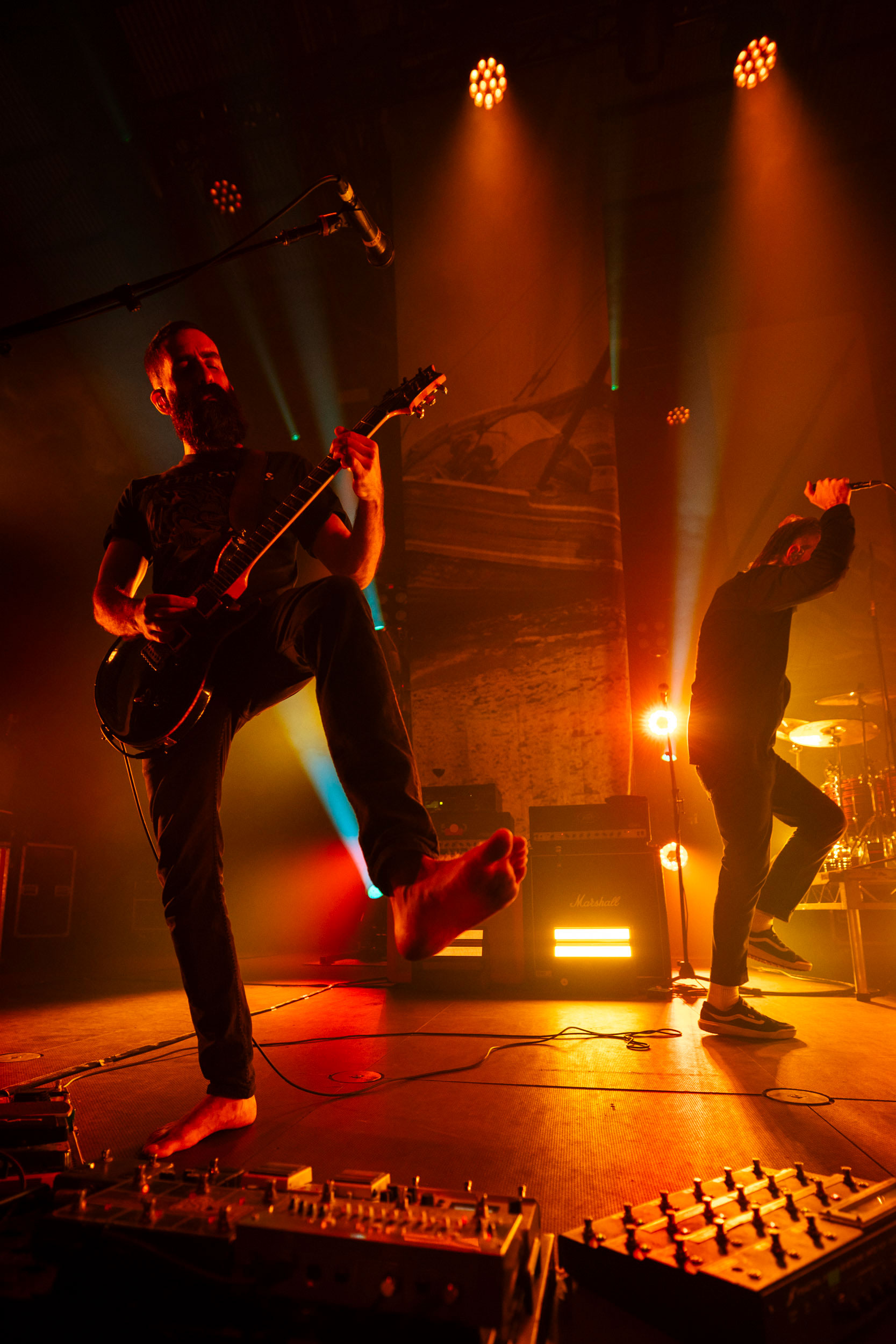 Karnivool guitarist Drew Goddard stomping pedals in his bare feet