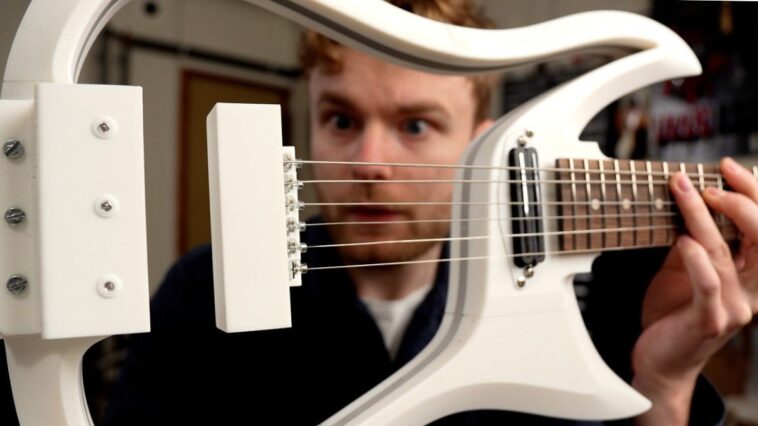 "YouTuber Creates Innovative Guitar with Floating Strings – It Revolutionized His Playing Experience!"]