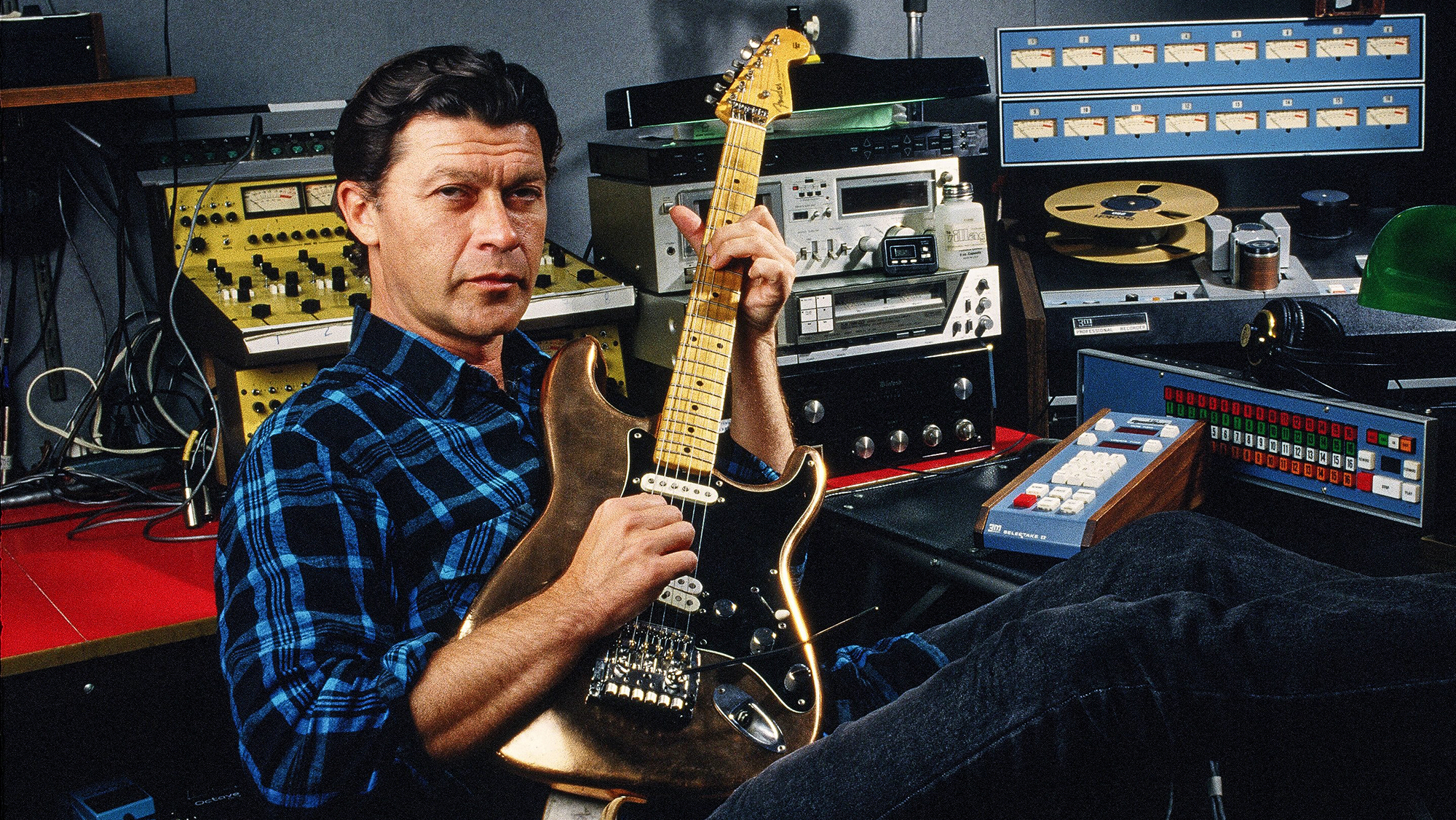 Former lead singer of "The Band," Robbie Robertson, poses in his recording studio during a 1987 Santa Monica, California photo session to promote his first solo album "Robbie Roberston."