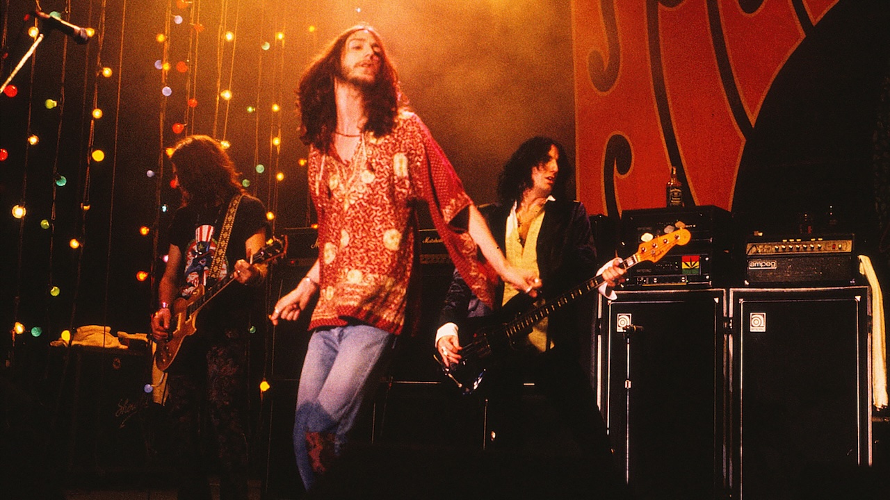 Chris Robinson, Jeff Cease, and Johnny Colt perform in The Black Crowes at The Greek Theatre on October 23, 1992 in Los Angeles.