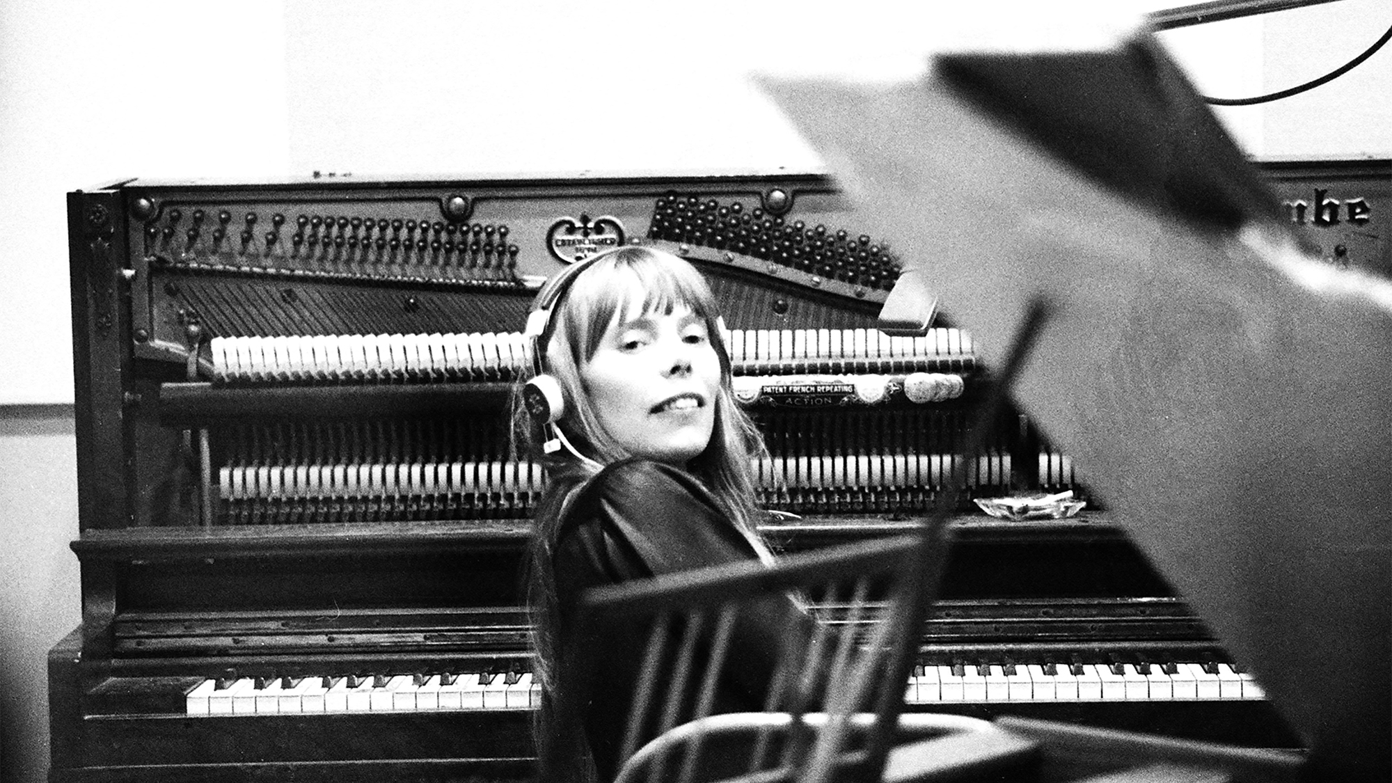 Musician Joni Mitchell recording her first album "Song to a Seagull" at Sunset Sound Recorders in 1967 in Los Angeles, California.