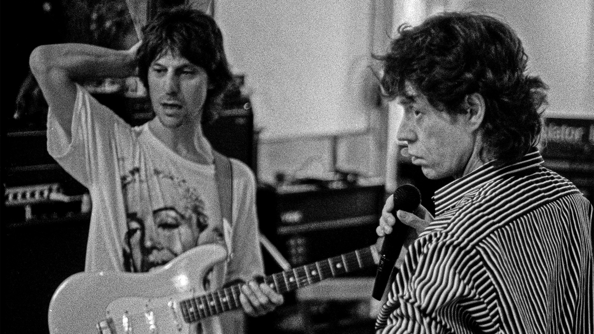 Guitarist Jeff Beck and singer Mick Jagger rehearsing together while working on Jagger's solo album, Primitive Cool.