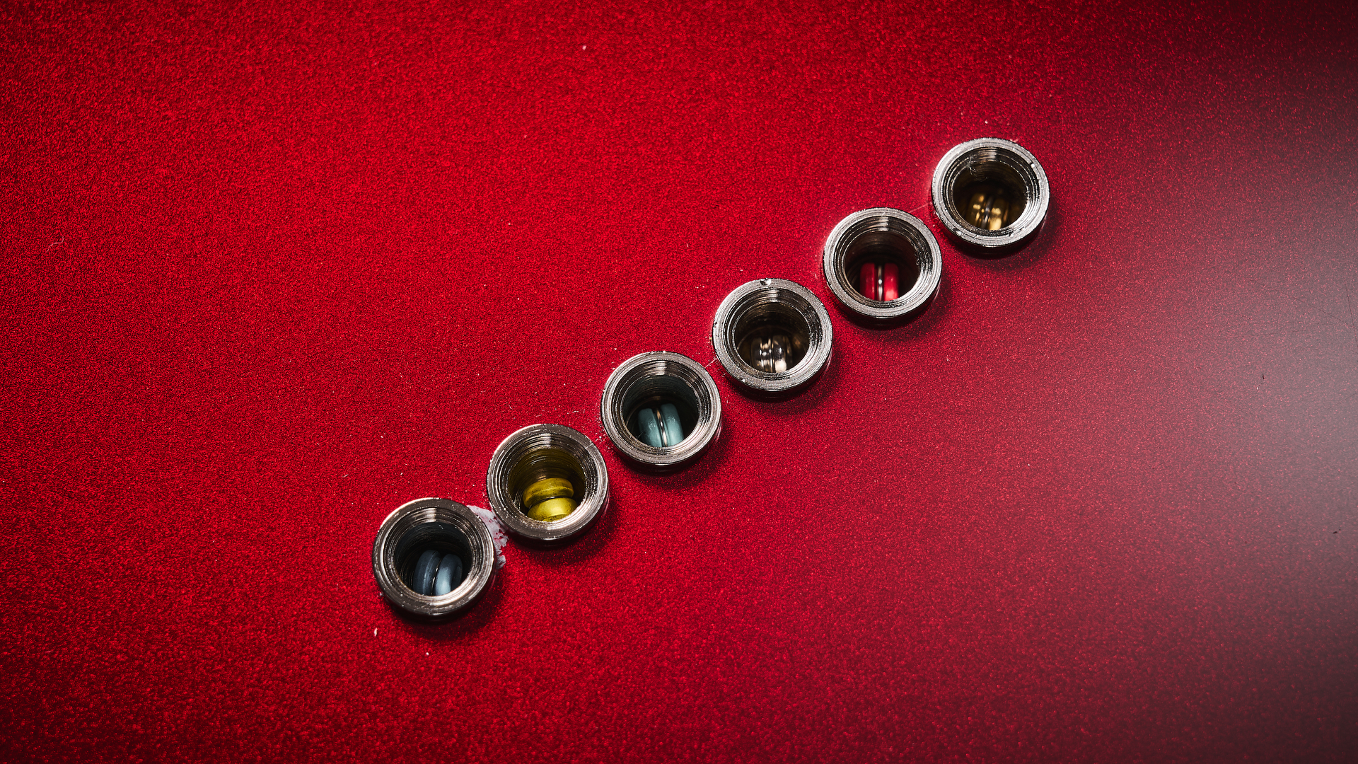 Close up of the string ferrules on a Fender 75th Anniversary American Professional Classic Cabronita Telecaster electric guitar