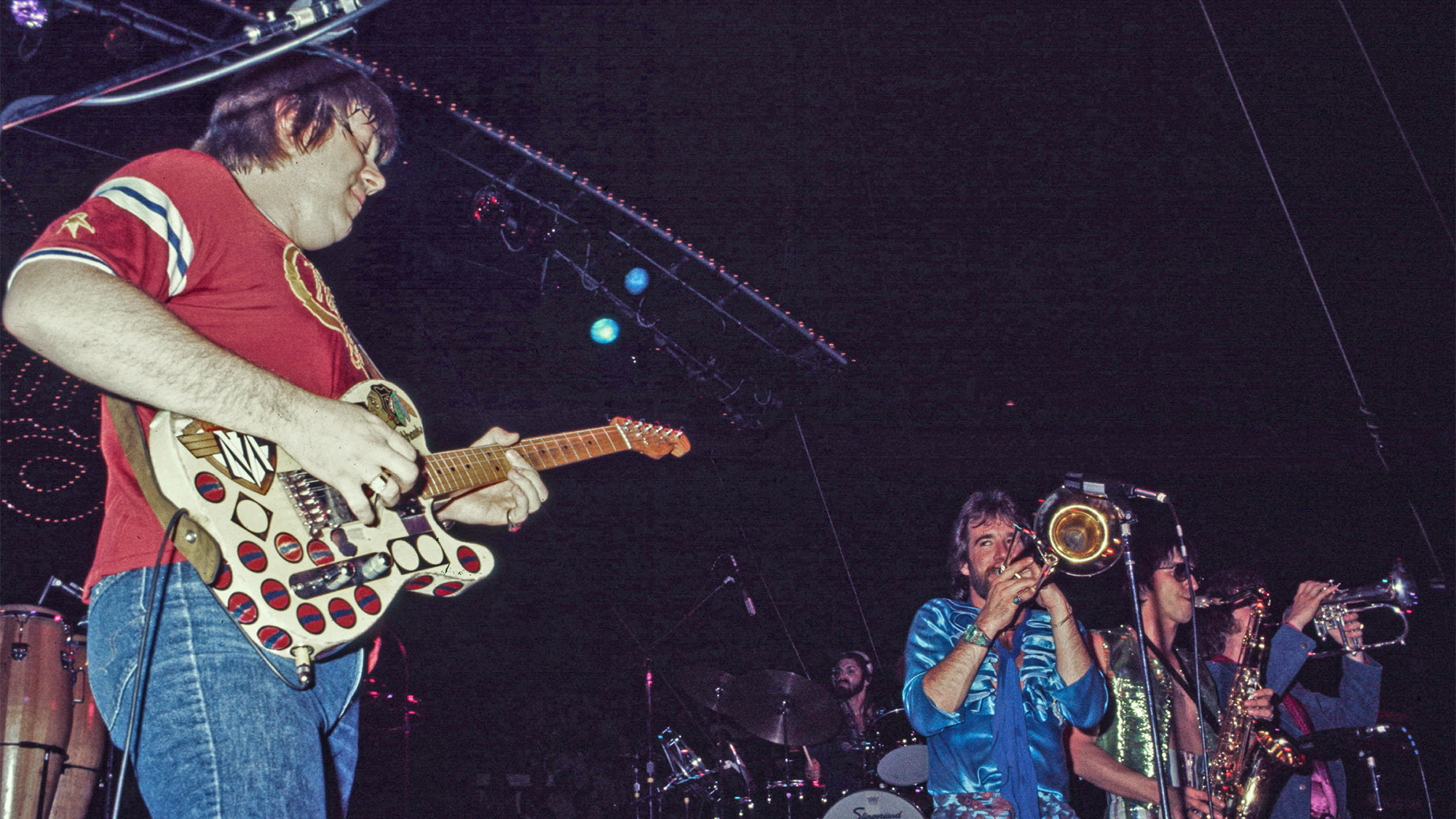 L-R Terry Kath, James Pankow, Walter Parazaider and Lee Loughnane performing onstage with Chicago, January 1975