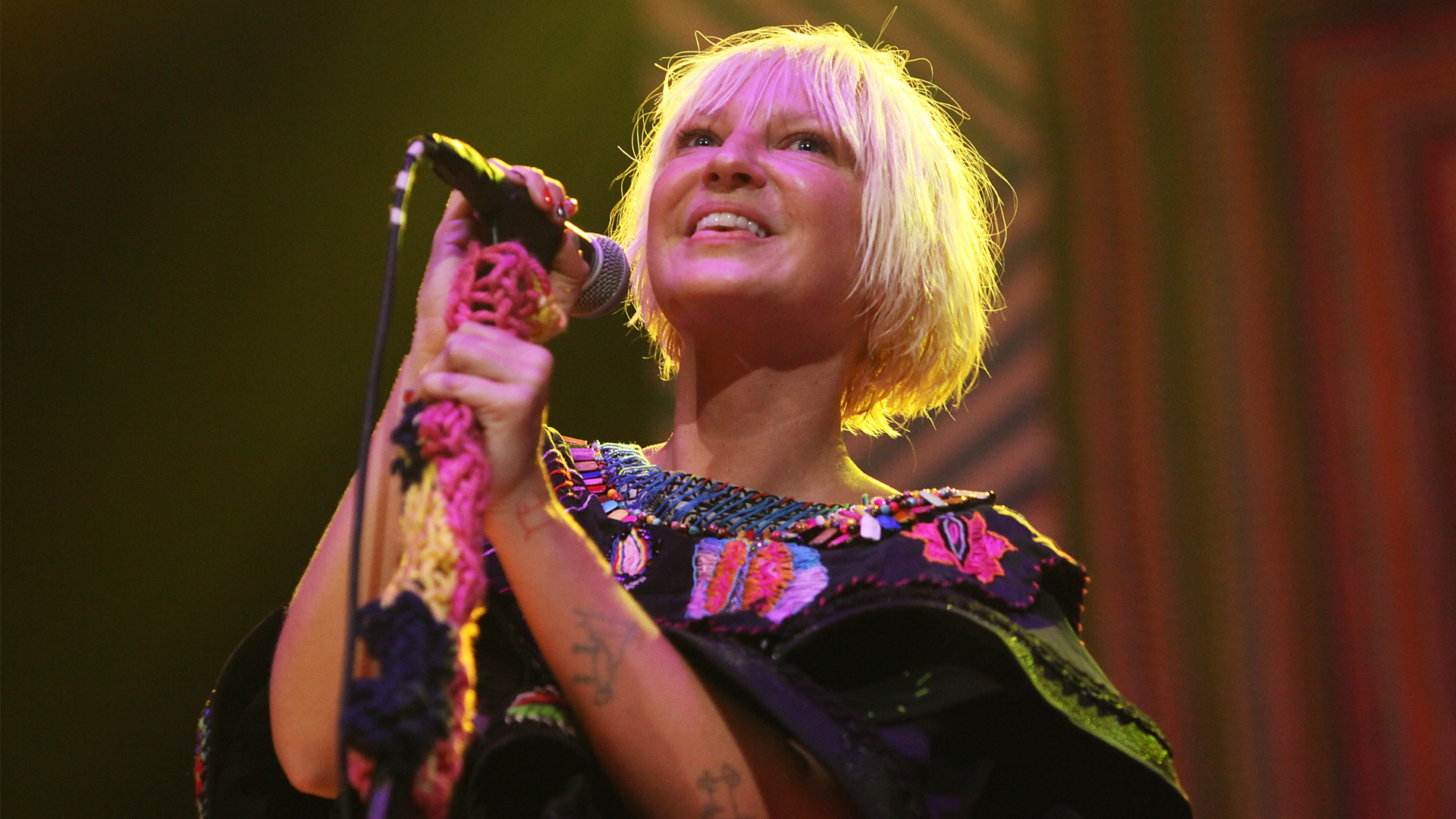 “Better Left Undiscussed: The Controversial Background of the David Guetta Monument That Catapulted Sia into the Spotlight”]