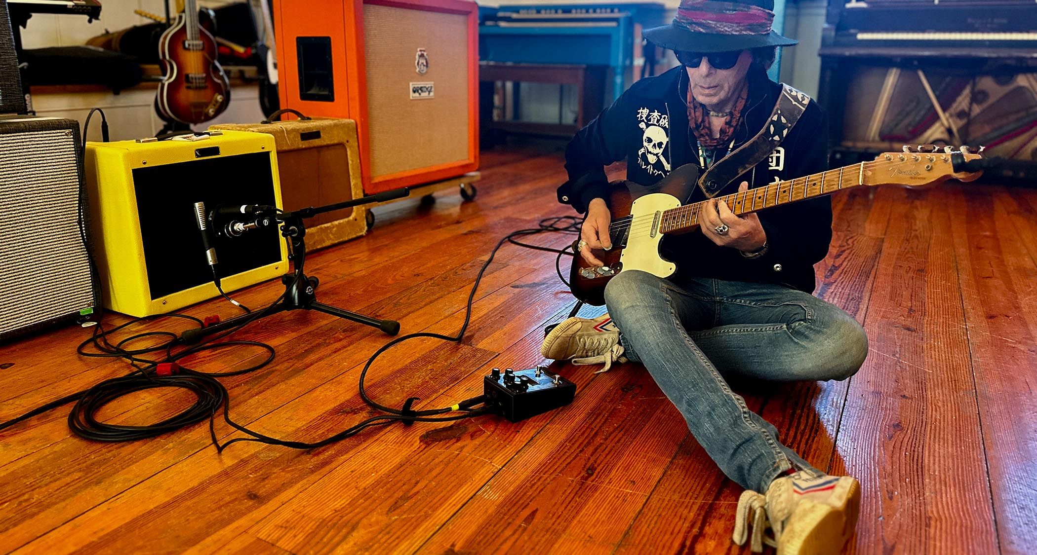 David Bowie's longtime guitarist discusses his new band.]