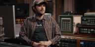 “Jim-E Stack unveils the low-fidelity production methods behind Bon Iver's 'Walk Home,' explaining that the Juno-DS keyboard was directly connected to Logitech speakers without any board or interface.”]