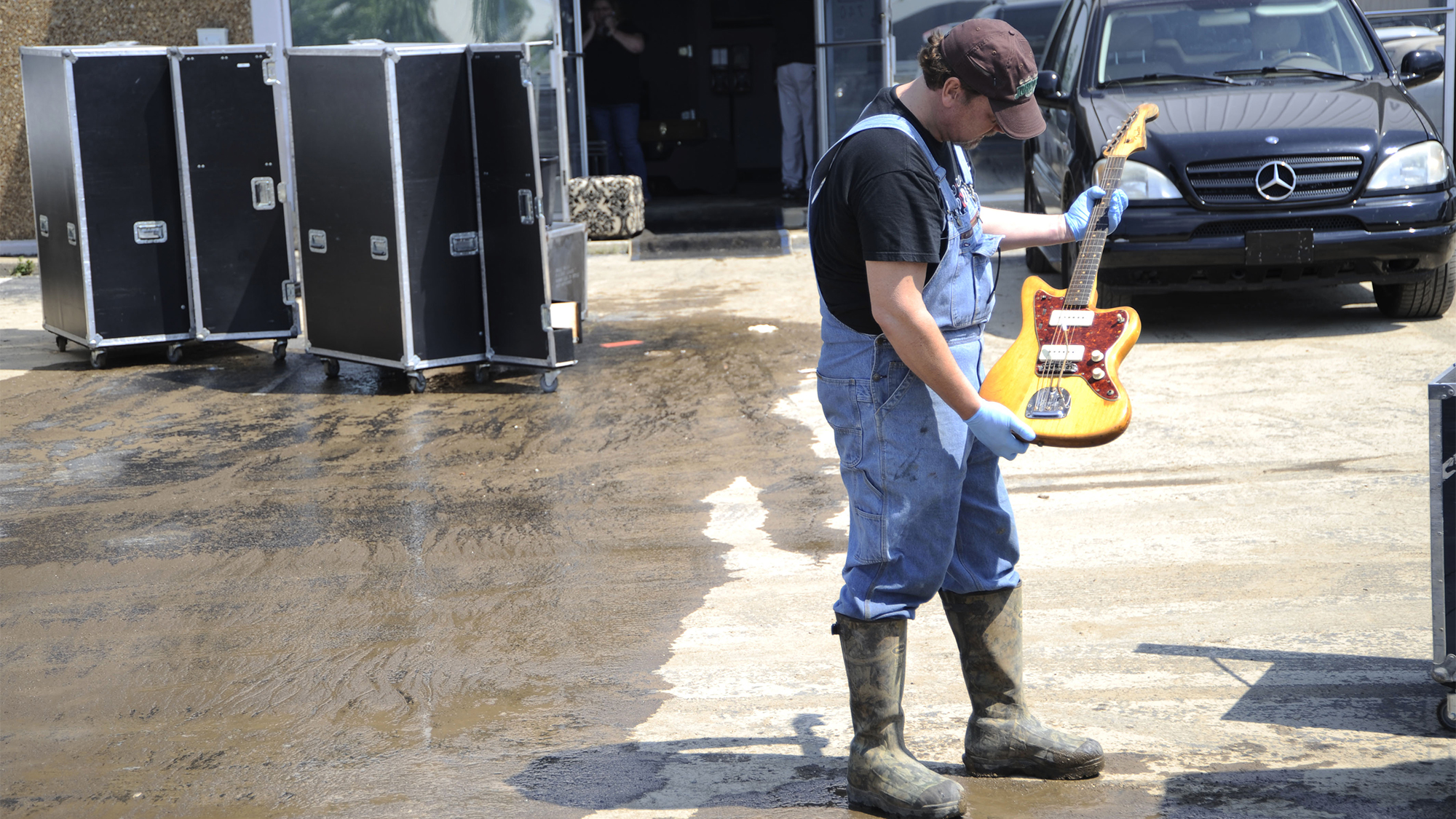 Brent Ware pulls a Fender guitar from the city's largest musician equiptment storage faciltiy Soundcheck Nashville on May 7, 2010 in Nashville, Tennessee. Massive rainstorms caused at least 29 deaths and the Cumberland River to rise to highest level in over 70 years, flooding its banks. The floods are estimated to have caused at least one billion dollars worth of damage.