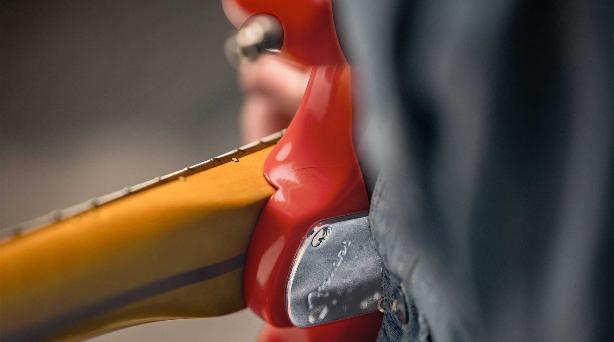 A detail photo of the Fender American Ultra Luxe Vintage &rsquo;60s Stratocaster HSS in Fiesta Red
