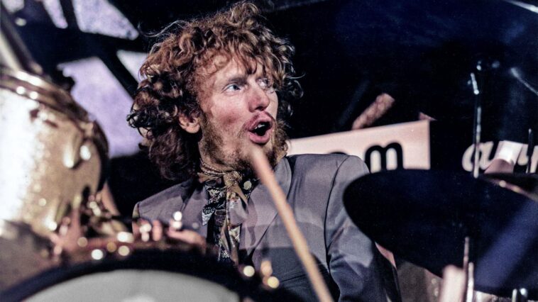 "Let’s go, pick up the pace!" John McLaughlin reminisces about the evening Ginger Baker began hurling drumsticks at Jack Bruce.]