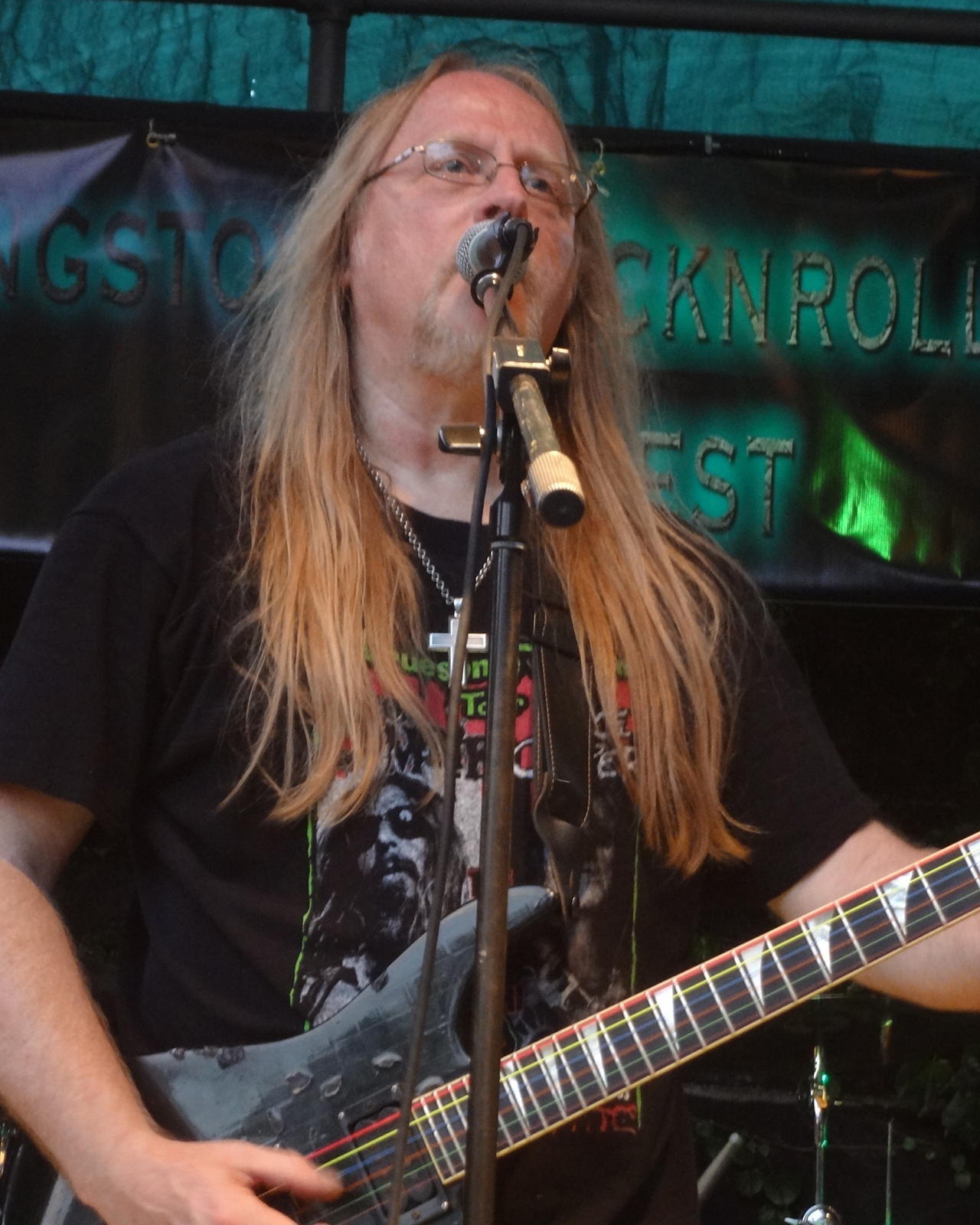 Jim Gustafson of Poobah performs onstage