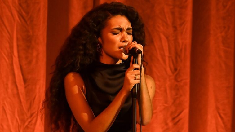 "Olivia Dean Celebrates Winning Big at the Mobo Awards: 'I’m So Proud to Be a Black British Female Artist,' Plus Pharrell Williams Receives a Special Songwriting Award from Nile Rodgers"]