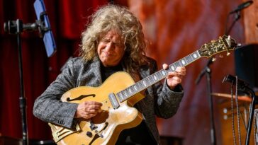 Pat Metheny transforms budget versions of his Ibanez signature guitars into art pieces.]