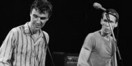 “Upon entering the spacious room, I found Tina visibly distraught. She asked me, ‘If we let David go, would you consider joining the band?’”: Adrian Belew claims he was approached about replacing David Byrne in Talking Heads.]
